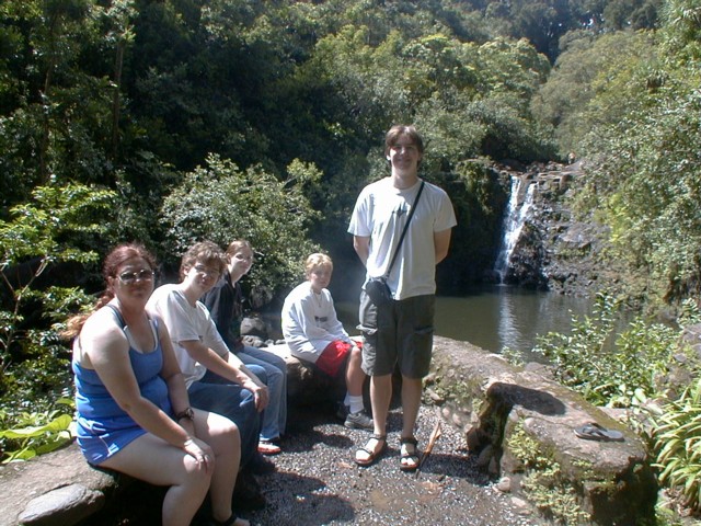 family at waterfall